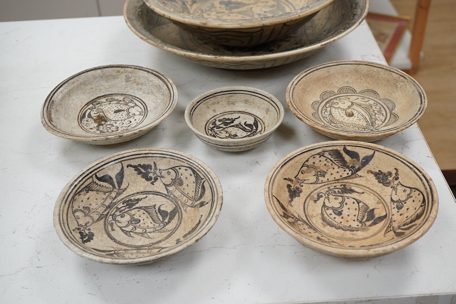 A group of Thai ceramic dishes, possibly Sukothai, largest 36cm